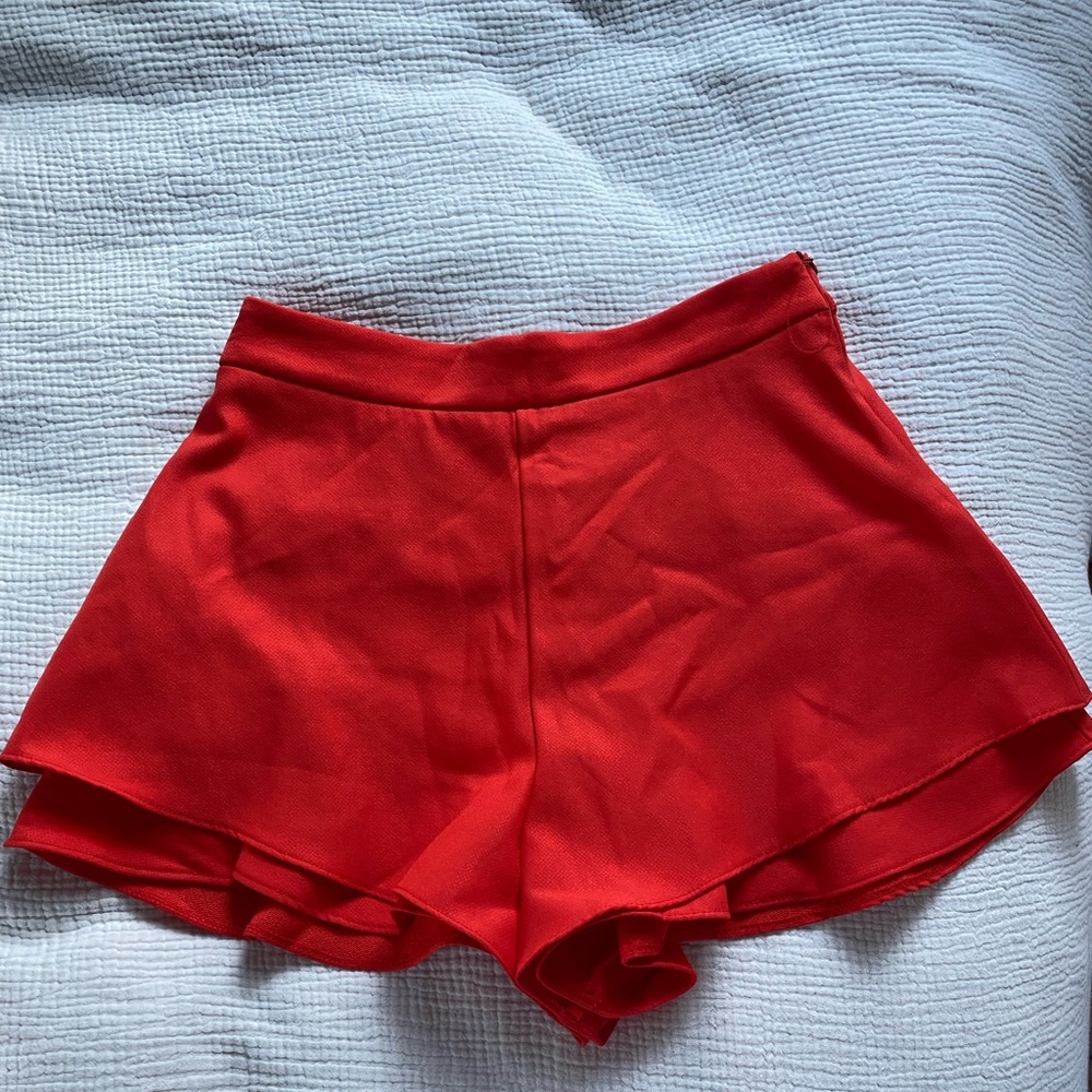 Red flowy shorts in great condition. Size S.